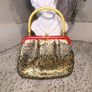 Vintage Black and Gold Floral Frame-Top Handbag with Red Trim